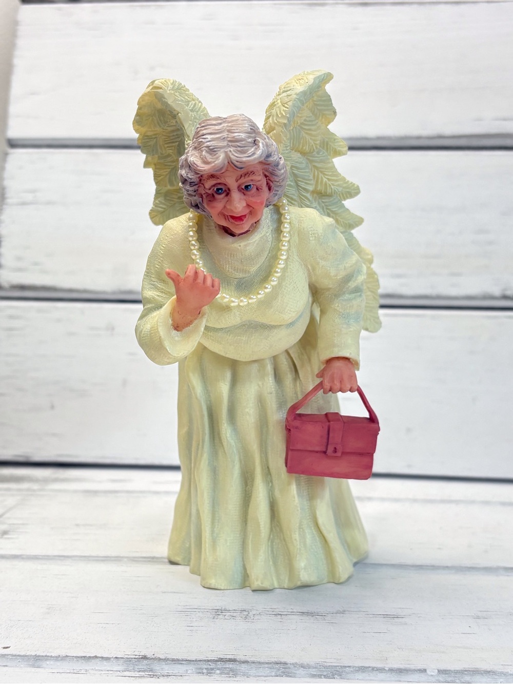 (221)Heaven’s Retired AngelsStudio Cream Angel Figurine with Pink Purse
